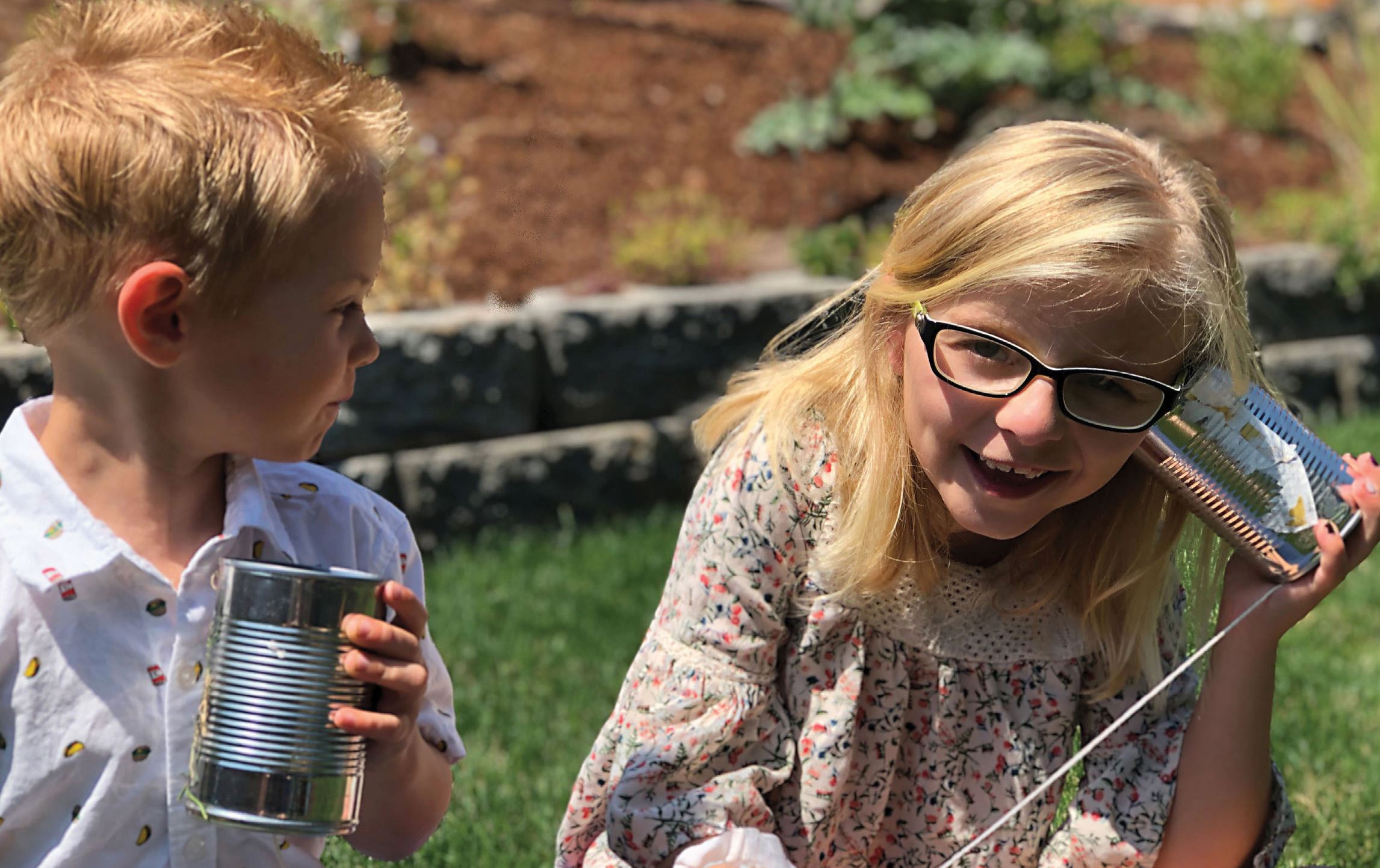 Two children practicing communication 